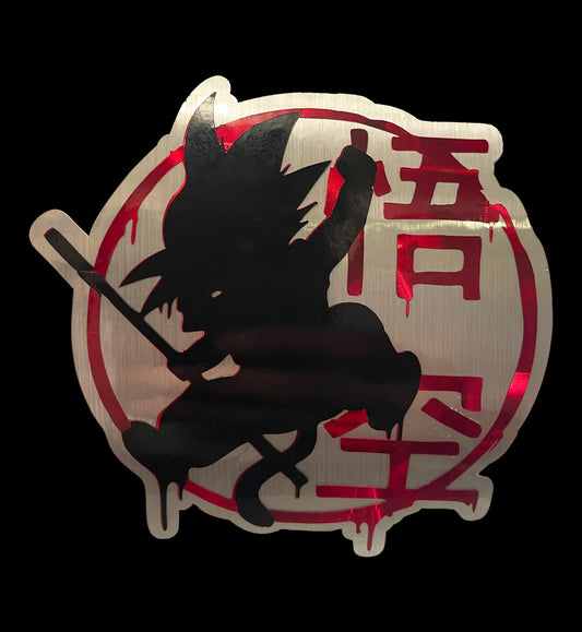 Brushed Metal Look with Red Holographic Goku Silhouette