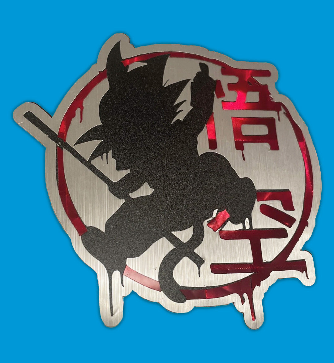 Brushed Metal Look with Red Holographic Goku Silhouette