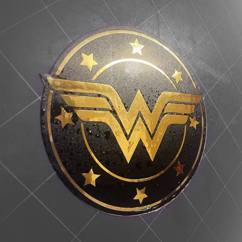 Wonder Woman Gold Emblem Decal – Waterproof Vinyl Sticker for Car, Laptop